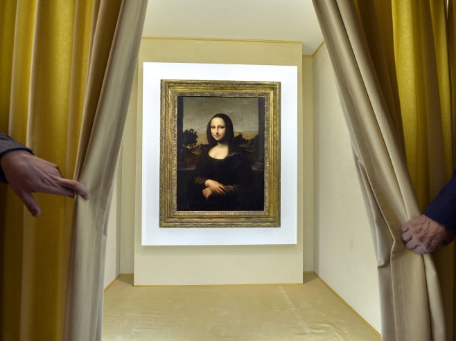 Мона Лиза (Фото: EPA/MARTIAL TREZZINI) - 