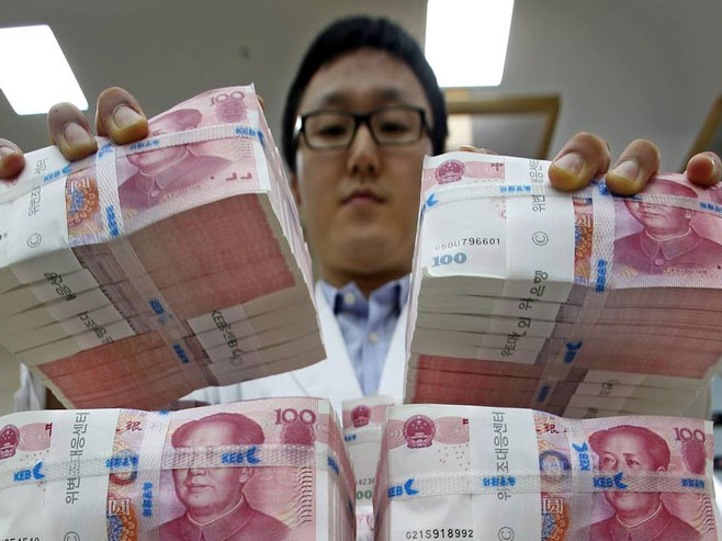 Кинески новац (јуан) (Фото: occupy.com) - 